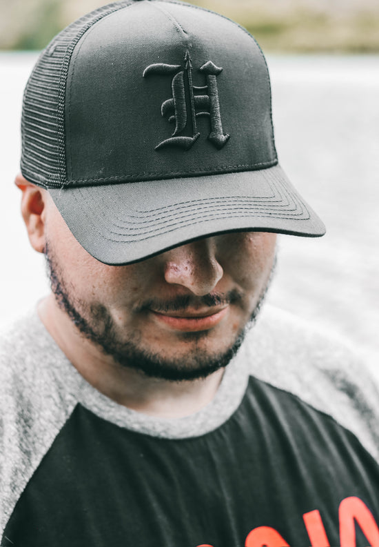 H SPEAR All Black Trucker